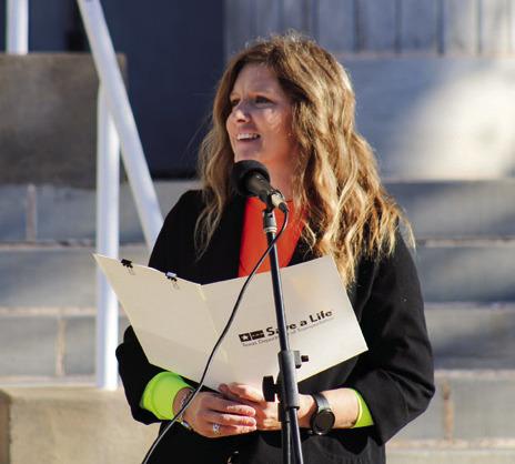 Texas Department of Transportation (TxDOT) Childress District Traffic Safety Specialist Nicole Tyler addresses the crowd, including local law enforcement and first responders, at the End the Streak press conference Friday, Nov. 15 at the Childress County Courthouse.