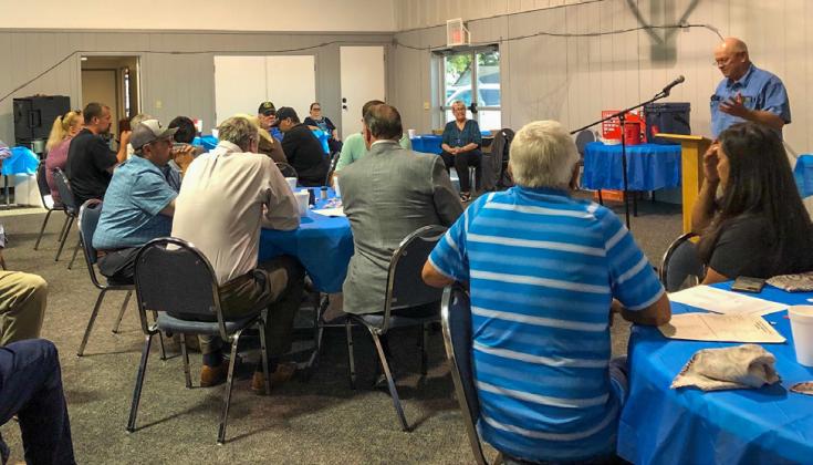 Tri-County Co-Op Manager Jeff Camp addresses the stockholders, special guests and visitors at the Annual Meeting on Thursday, Aug. 24 at the Dodson Family Life Center. By Bev Odom The Red River Sun/Bev Odom