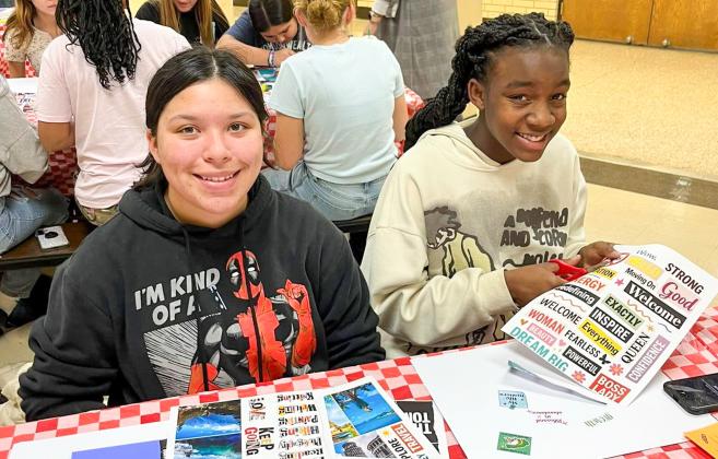 Memphis Middle School Lady Whirlwinds create vision boards during Dream Night with Ms. Ollinger. Memphis ISD