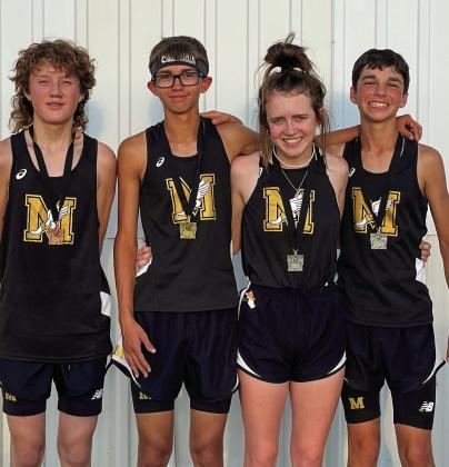 Four Cyclone cross country runners, including Ethan McAllister, left, Ryder Robison, Braylee Brooks and Kyler Robison, medal at the recent 18th Annual Rattlesnake Run, held Tuesday, Sept. 13 in Guymon, Okla. K. Robison finished 18th in the junior high division, while McAllister finished 15th in the junior varsity division. In the varsity division, R. Robison finished third, while Brooks finished 11th. Photo Courtesy of Memphis ISD