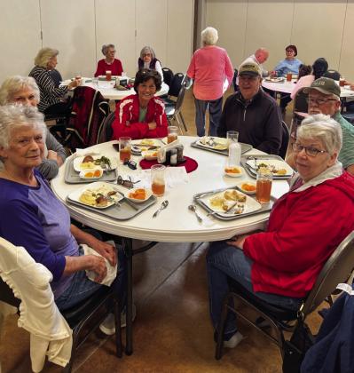 Collingsworth County senior citizens, including Pat Roberson, left, Beverly Ray, Shannon and Danny West and Larry and Janet Haddock, gather for lunch at the Community Café, situated inside Wellington Senior Citizens Center at 906 Amarillo St. Courtesy Photo