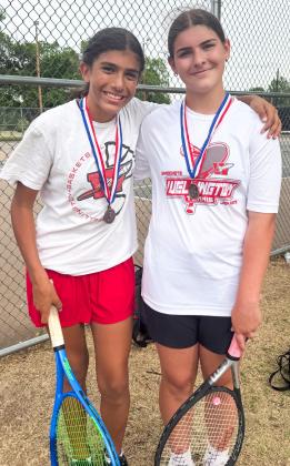 Seveyah Pena, left, and Rachel Strickland, thirdplace girls’ doubles.