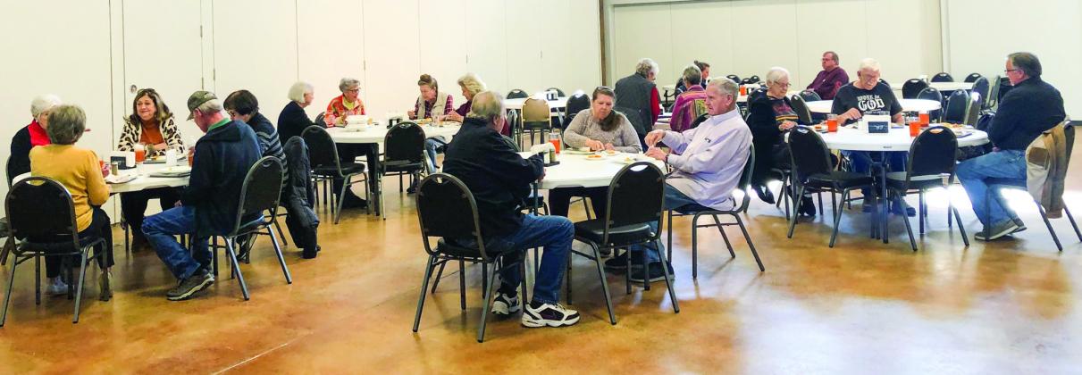 Collingsworth County citizens over 60 years of age gather at the Senior Community Café for its first day of dine-in food service. The 60 registered participants are invited to participate in the soft opening from 11:30 a.m. to 12:30 p.m. through Friday, Dec. 2. Beginning Monday, Dec. 5, anyone in the community can come and eat whether registered for the program or not, and whether they are 60 years old or not. The Red River Sun/Bev Odom