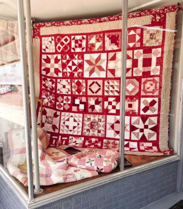 Wellington Methodist Women’s 2024 quilt creation, “Women of the Bible,” graces the display window of the Collingsworth County Museum during the Wild &amp;amp; Free on 83 events in August. Members sold raffle tickets during the affair. Tickets are $5 each or five for $20. For tickets, see Karen Caldwell at the museum or Bev Odom at “The Red River Sun” newspaper office. Tickets will also be sold during the annual bazaar fundraiser event this Saturday, Nov. 2. Courtesy Photo