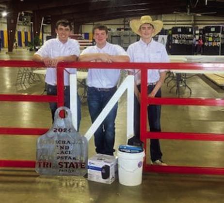 Childress High School’s Kaden Chapman, Tuck Detwiler and Tripp Tippett recently compete at the Tri-State Fair and Rodeo Ag Mechanics Show Friday, Sept. 13 in Amarillo. Winning second-place sweepstakes, the trio received a first-place class win on an entry gate, while Detwiler received a first-place class win on his individual entry of a coffee table. Courtesy Photo
