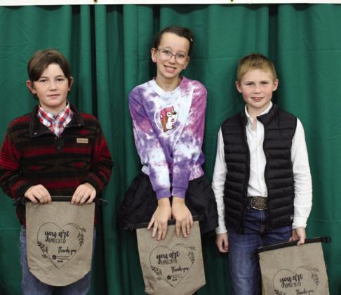 Junior Division – Main Dish From left: Saylor Wyatt, fourth place; Sophia Brown, third place; Kolt Whitaker, first place. Not pictured: Henleigh Foster, second place.