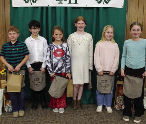 Junior Division – Healthy Dessert From left: Daniel Rister, second place; Bentley Sanford, sixth place; Cambri Willis, third place; Liesel Schaefer, first place; Rebekah. Whitaker, fourth place; Olivia Wyatt, fifth place.