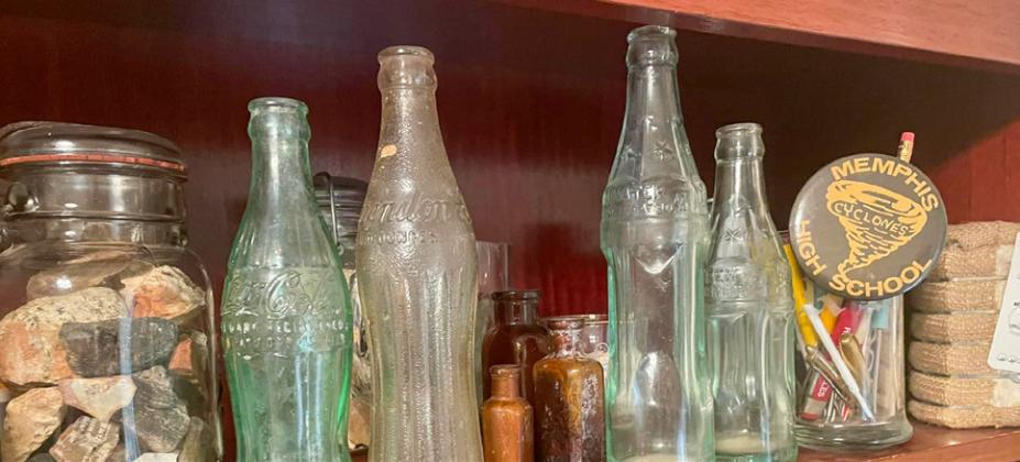 Four different styles of Memphis Coca-Cola Bottling Company bottles.
