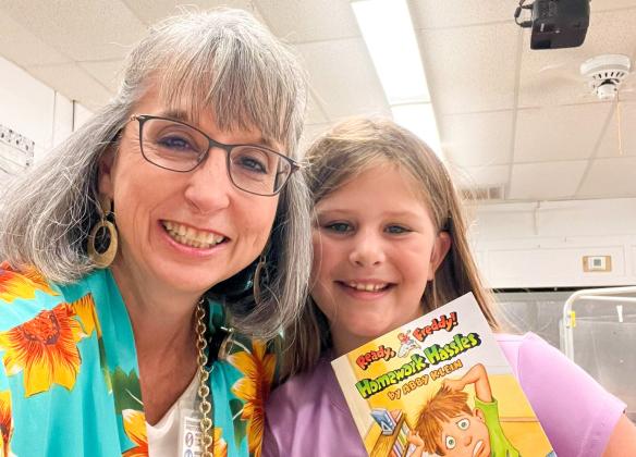 Austin Elementary School students cash in their Classroom Hero points, participating in activities including eating lunch with Austin Elementary School Principal Trisha Smith and reading with Memphis Independent School District Director of Curriculum and Instruction Leigh Ann Hawthorne.