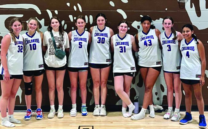 Childress Lady Cat junior high, junior varsity and varsity team members attend the recent Elk City Girls Basketball Camp in Elk City, Okla. Courtesy Photos