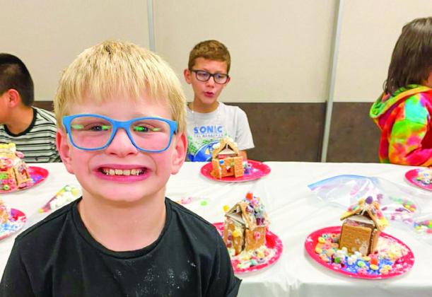 Austin Elementary School students celebrate reaching 50% of their Accelerated Reading (AR) goal Friday, Dec. 6, constructing gingerbread houses. Photos Courtesy of Memphis ISD