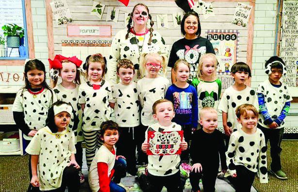 Wellington Head Start teacher Rhae Jones’ students dress as the “101 Dalmations,” with assistants Paige Owen and Marci Peters.