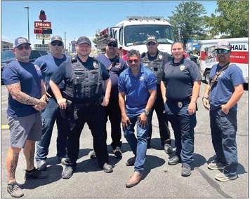 In conjunction with a ribbon cutting event, McDonald’s hosts Meet the First Responders of Childress Wednesday, July 12, thanking local first responders and law enforcement, including the Childress Fire Department, which was gifted a $500 donation. The Red River Sun/Elizabeth Oronia and Childress Chamber of Commerce