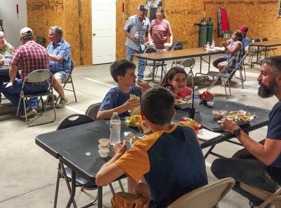 Patrons of the Wellington Emergency Medical Services (EMS) 2023 fundraiser dine. The Wellington EMS staff orchestrated a soft taco fundraiser from 6-8 p.m. Tuesday, June 13 at the Wellington EMS Barn. Staff serve pulled pork or taco meat, along with an array of ingredients, on a flour tortilla, as well as chips and a bottle of water. Wellington EMS Administrator Farris Nation expressed his appreciation for all in attendance and is grateful for the $2,000 collected in donations. The Red River Sun/Bev Odom