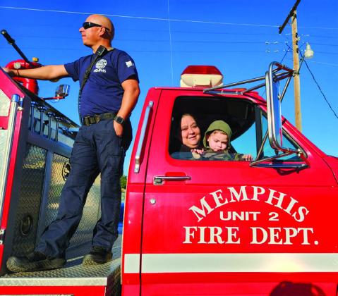 Travis Elementary School and Austin Elementary School students brush up on fire safety during Fire Prevention Week, thanks to the Memphis Volunteer Fire Department, who not only taught students the importance of fire prevention, but also gave the students rides atop the firetrucks. Photos Courtesy of Memphis ISD