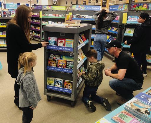 Hartman family visits Collingsworth Public Library’s book fair