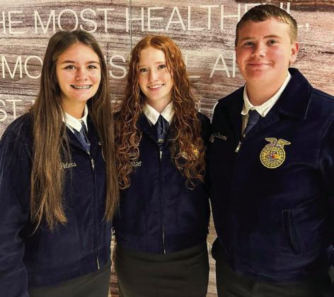 Wellington High School junior Bailey Page places eighth in Senior Creed Speaking, while the Farm Radio Broadcasting team places seventh. From left: Senior Heather Peters, Page, junior Jace Darrow. Wellington High School