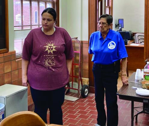 Childress County Heritage Museum Board Member Ramona Garcia, right, introduces new Childress County Heritage Museum Director Niki Seal.