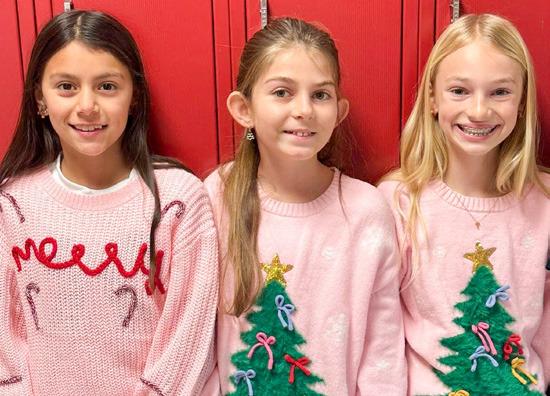 Wellington Elementary Sparklers sport ugly Christmas sweaters