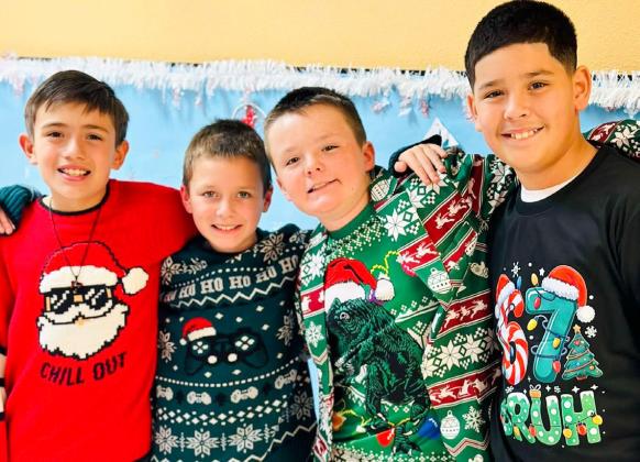 Wellington Elementary Sparklers sport ugly Christmas sweaters