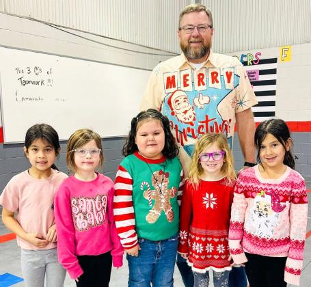 Wellington Elementary Sparklers sport ugly Christmas sweaters