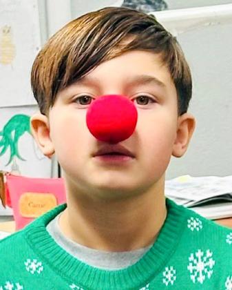 Wellington Elementary Sparklers sport ugly Christmas sweaters