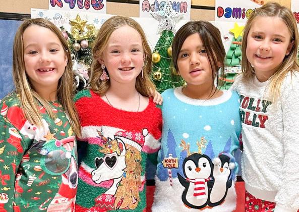 Wellington Elementary Sparklers sport ugly Christmas sweaters