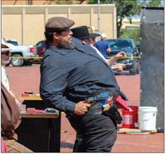 Texas Panhandle Pistoleros member Doc Edward competes in the Texas Panhandle Championships during the 88th Annual Hall County Picnic Saturday, Sept. 16. For additional photos, see 8B.