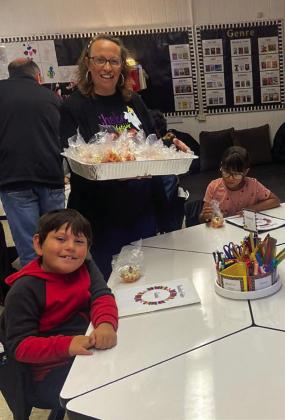 Wellington State Bank pays Austin Elementary a ‘sweet’ visit