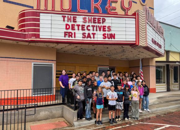 Austin Elementary School and Memphis Junior High School students visit the Mulkey Theatre in Clarendon, where they met for a showing of “The Sheep Detectives” — a treat for meeting their Accelerated Reading (AR) goals. TARA ALLRED/THE GREENBELT INTREPID