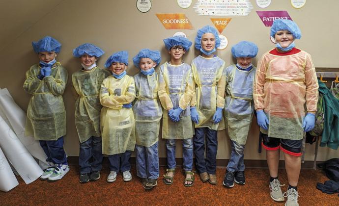 The journeyman class suits up to perform “surgery.”