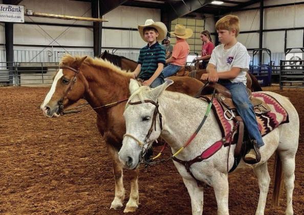 Childress 4-H Horse Club practices barrels,poles