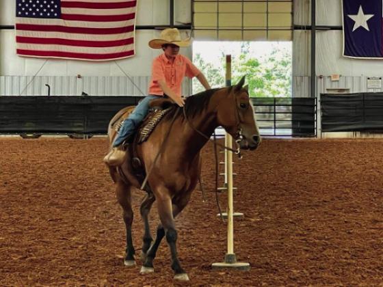 Childress 4-H Horse Club practices barrels,poles