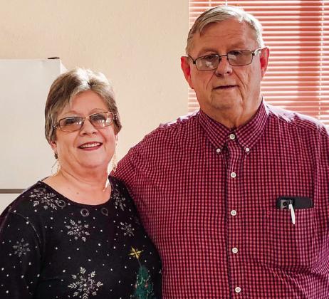 Saundra and John James mark his retirement with 18 years and 5 months of sevice as Collingsworth County Judge.