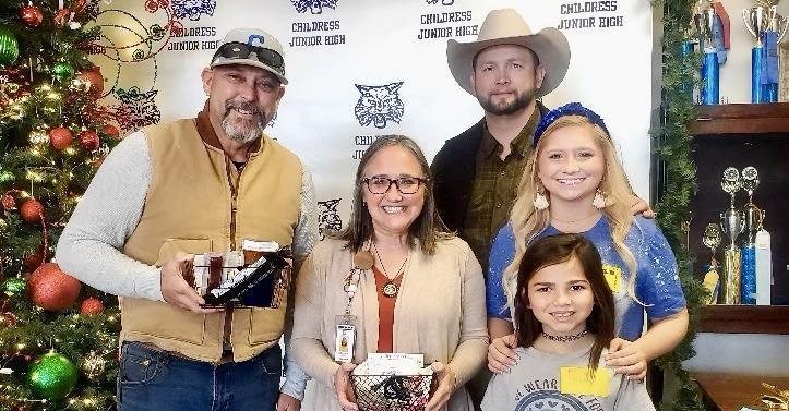 From left: Childress Junior High School special education teachers Jody Simmons and Felicia Harris, Childress County Sheriff Matthew Bradley, Bailey Bradley, Kenlynn Bradley.
