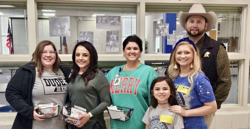 From left: Childress High School special education teachers and paraprofessionals Amanda Wilson, Karen Rodriguez and Jenica Hightower, Kenlynn Bradley, Bailey Bradley, Childress County Sheriff Matthew Bradley.
