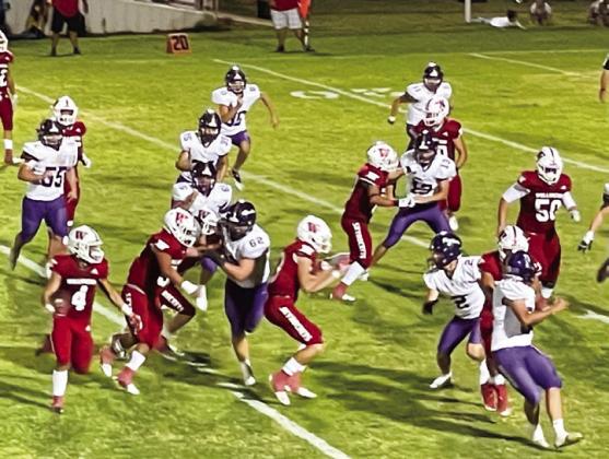 Skyrocket Gumaro Rincon (4) runs the ball behind the Rocket offensive line in a game against the undefeated Panhandle Panthers, where Wellington won 26-13 on Powell Field last Friday night, Sept. 23. The Red River Sun/Shauna Salinas