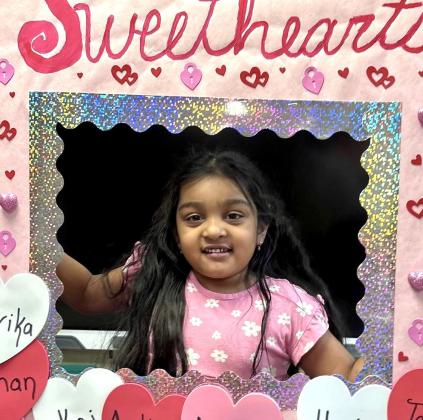 Austin Elementary School kindergarten students show off their smiles in a Sweethearts Conversation Hearts-themed frame. Memphis ISD