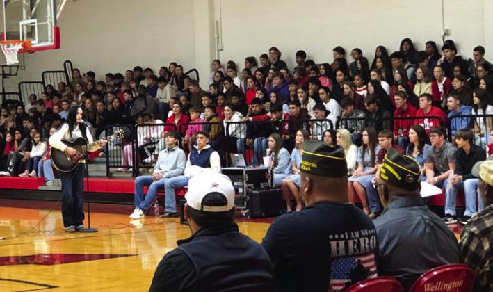 Wellington High School senior Kenedy Skelton performs “Traveling Soldier.”