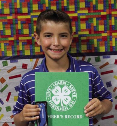 Quay Bruce placed fourth at district in Record Books – Horse. Not pictured is Cutter Bruce, who placed first at district in Record Books – Entomology.