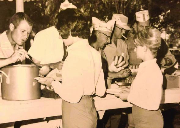 Servers feed hungry Hall County Reunion guests.