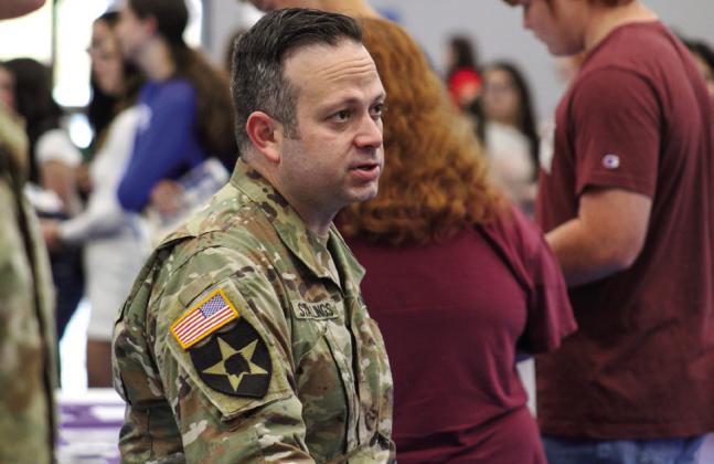 U.S. Army Recruiting Station Commander Robert Stallings speaks to students at the Childress High School College Fair. For additional photos, see 10A.