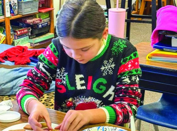 Fifth graders create gingerbread houses