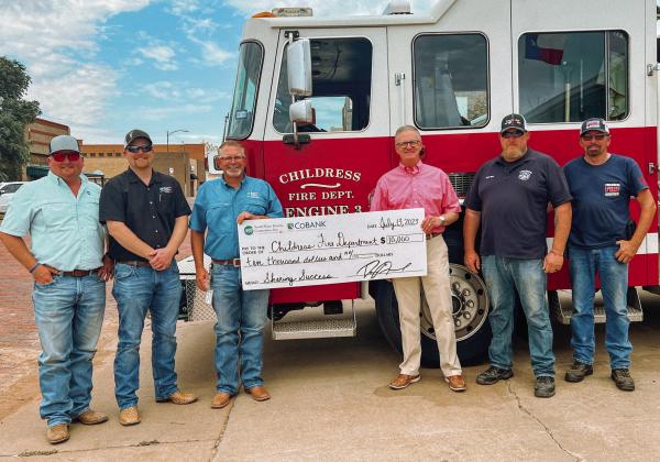 The Childress Fire Department receives a $10,000 donation from South Plains Electric Cooperative and CoBank to help them relocate their Firefighter Training Facility Thursday, July 13. Courtesy Photo