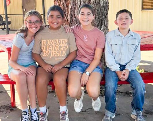 Wellington Junior School seventh-grade Firecrackers recently elected class officers, including President Adeline Deady, left, Secretary Tylee Wiebe, Vice President Quinn Roberson and Treasurer Ben Peters.