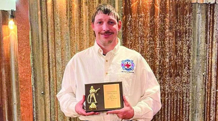 Memphis Volunteer Fire Department Volunteer Fireman Johnny Trent receives Memphis Volunteer Fire Department (VFD) Firefighter of the Year during the annual Christmas party Sunday, Dec. 10 at Lakeview Grill. “Johnny continuously works hard and always has a positive attitude,” Memphis Volunteer Fire Department said in a Facebook post. “Congratulations to Johnny Trent for being selected as the Memphis Volunteer Firefighter of the Year.” Photo Courtesy of Memphis Volunteer Fire Department