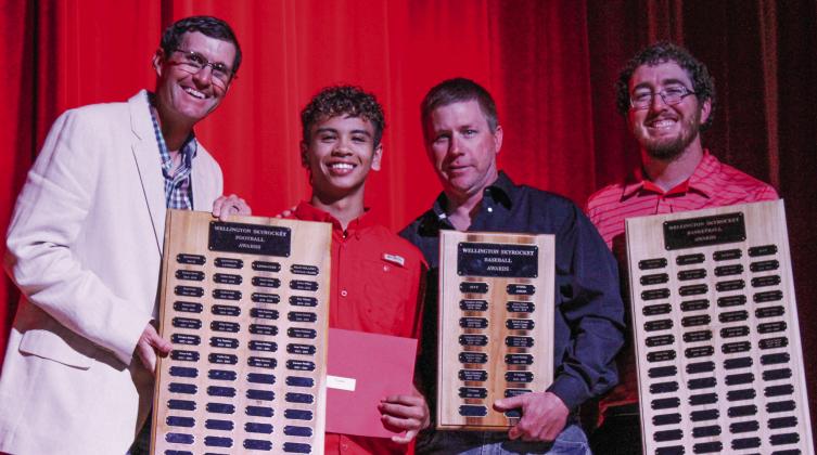 Wellington High School senior TJ Salinas garners the Football Sean Delaney-Special Teams Award, Baseball Most Valuable Player (MVP) Award and Boys’ Basketball Fighting Heart Award, presented by Athletic Director Greg Proffitt, Coach Jeff Anderson and Coach Quenton Patterson. For more, see page 4B.