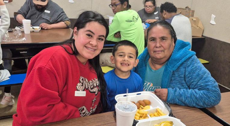 Austin Elementary School students’ family and friends join them for Christmas lunch Thursday, Dec. 18 in the Austin Elementary School cafeteria. Memphis ISD