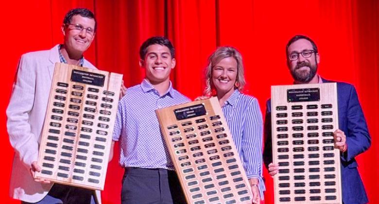 Wellington High School Senior Noah Cantu receives the Football Outstanding Back Award, presented by Athletic Director Coach Greg Proffitt, the Tennis Most Valuable Player Award, presented by Coach Amy Inman, and the Boys’ Basketball Defensive Award presented by Coach Colton Holmes.