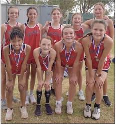 The Wellington Lady Firecrackers captured the cross country championship title at the Wheeler Invitational Saturday, Sept. 24. Four medaled, including Taytum Kane, who placed second, Aizlyn Menefield, who placed fifth, Ellie Thomas, who placed eighth, and Ceighley Killian, who placed ninth. Front row, from left: Menefield, Kane, Killian, Thomas. Back, from left: Addi English, Ingrid Granadoz, Anna Henard, Elli Ouellette, Maci Brewer. Courtesy Photo